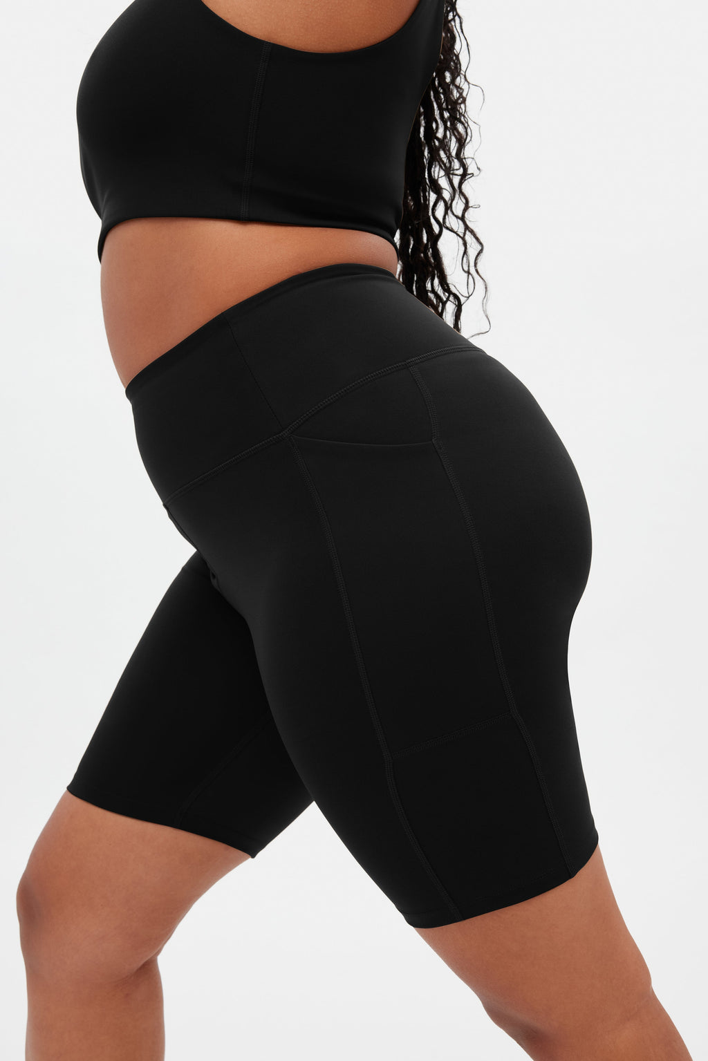 Short cycliste noir taille haute à poches
