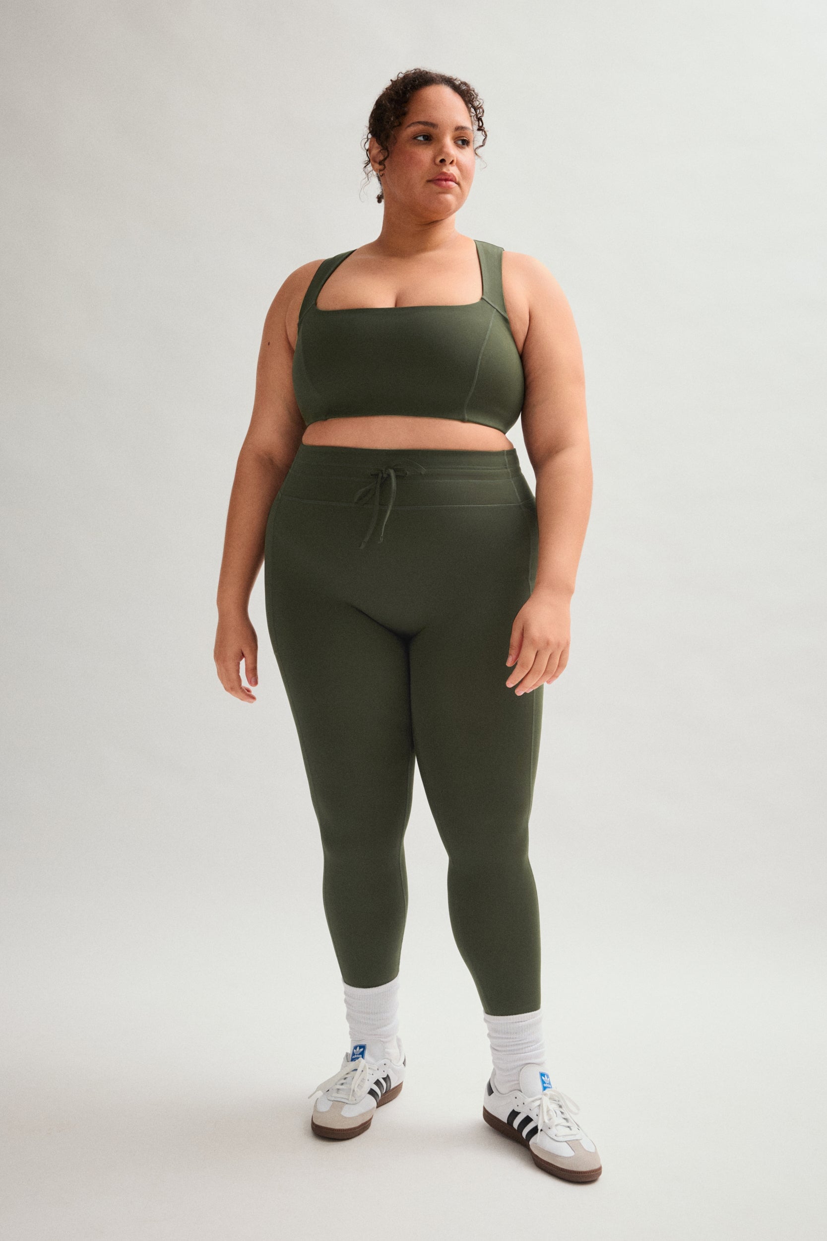 Legging de compression à cordon et poche plaquée
