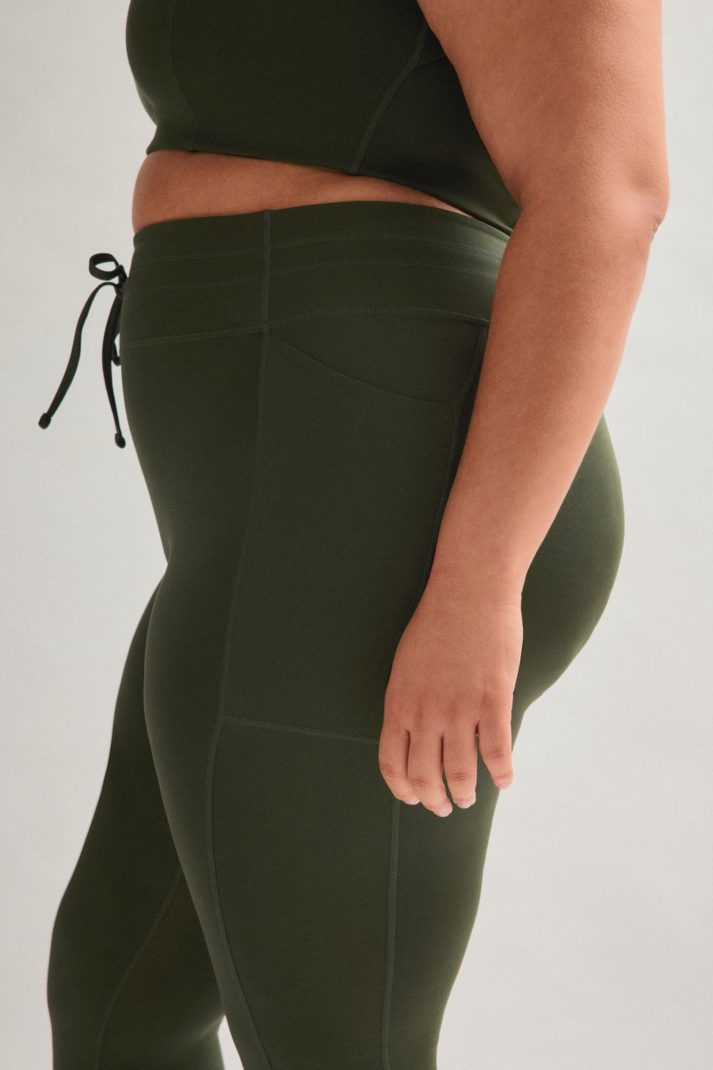 Legging de compression à cordon et poche plaquée