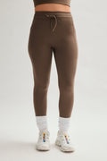 Legging de compression à poches et cordon de serrage
