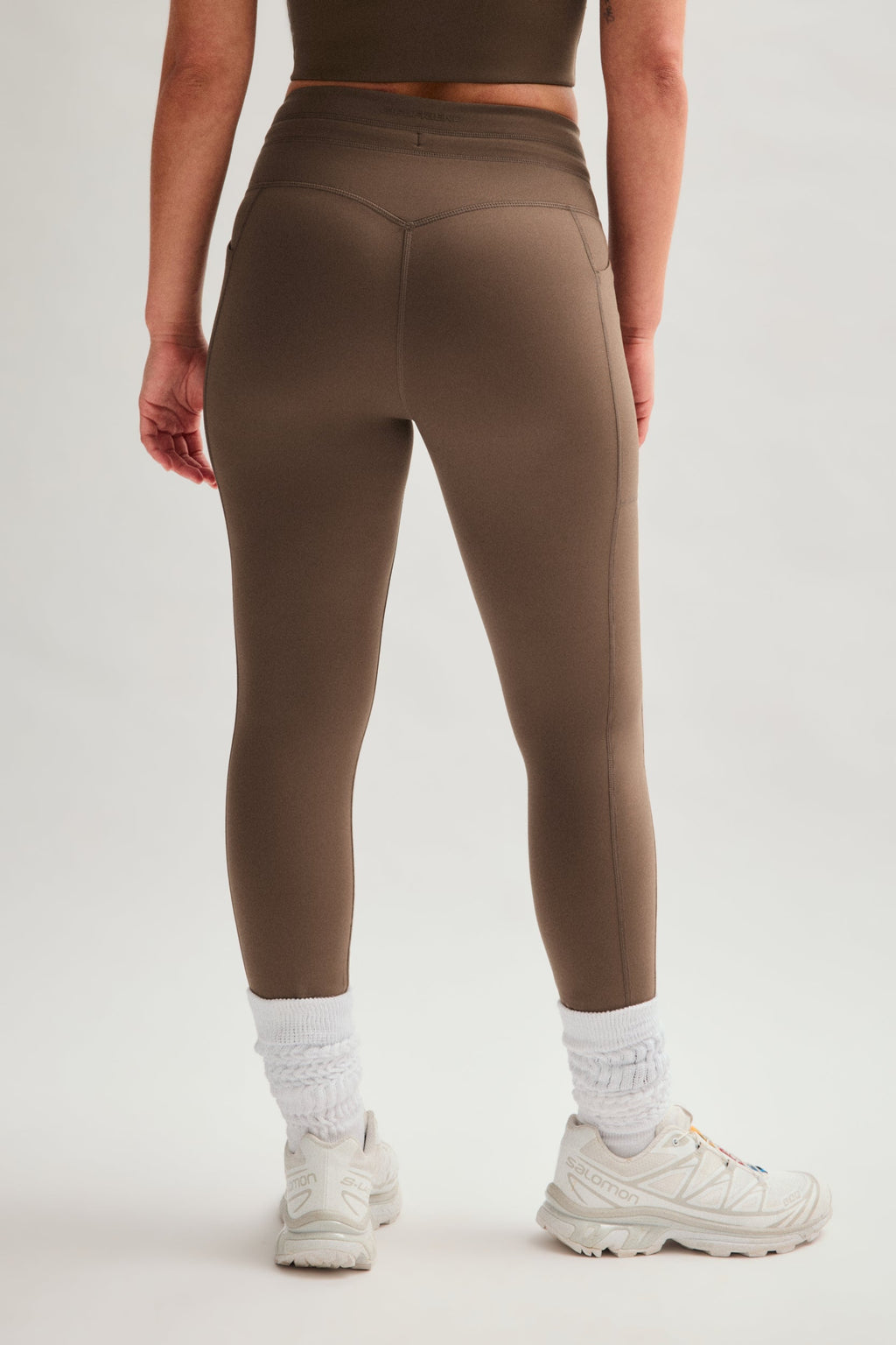 Legging de compression à poches et cordon de serrage