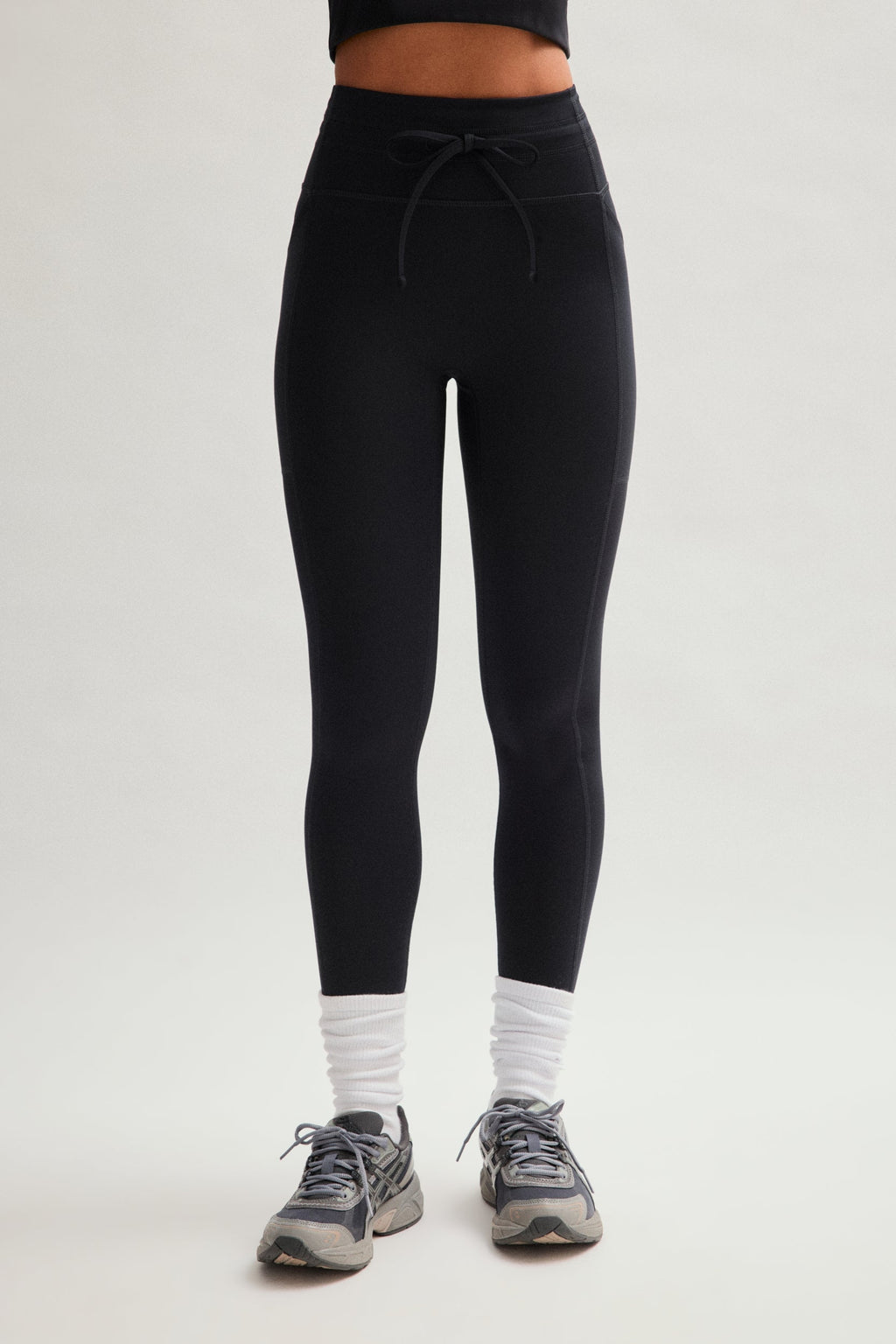 Legging noir compressif avec cordon de serrage et poches