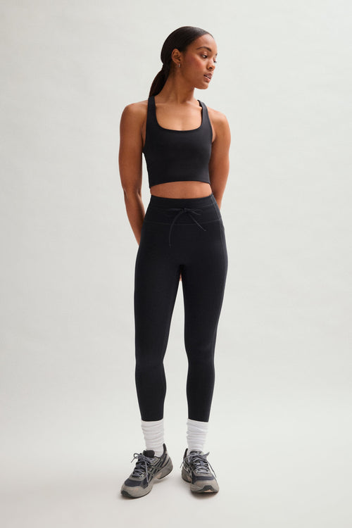 Legging noir compressif avec cordon de serrage et poches