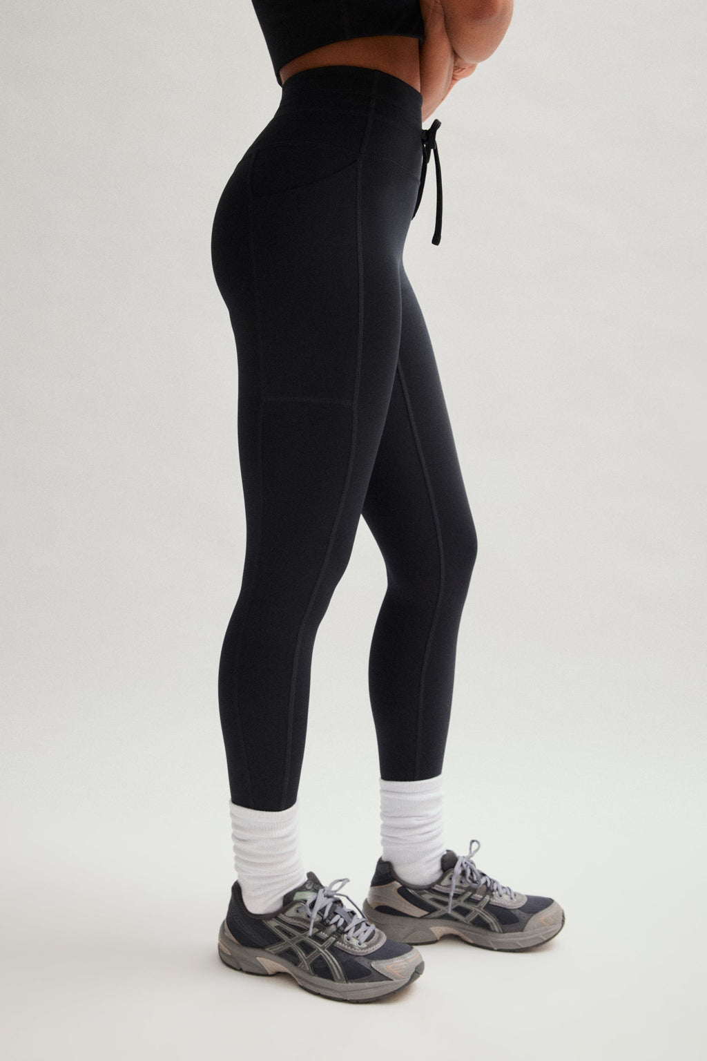 Legging noir compressif avec cordon de serrage et poches