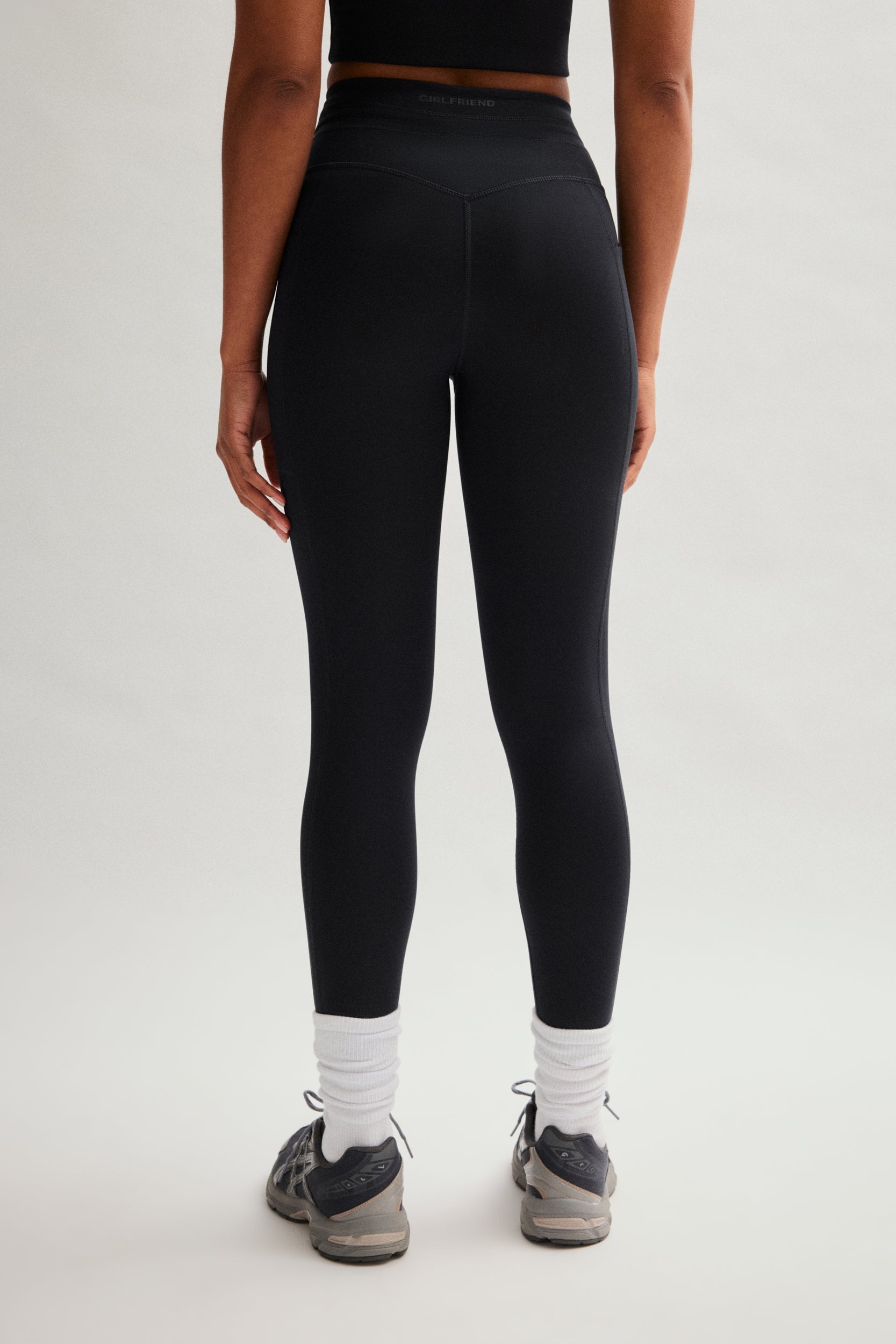 Legging noir compressif avec cordon de serrage et poches