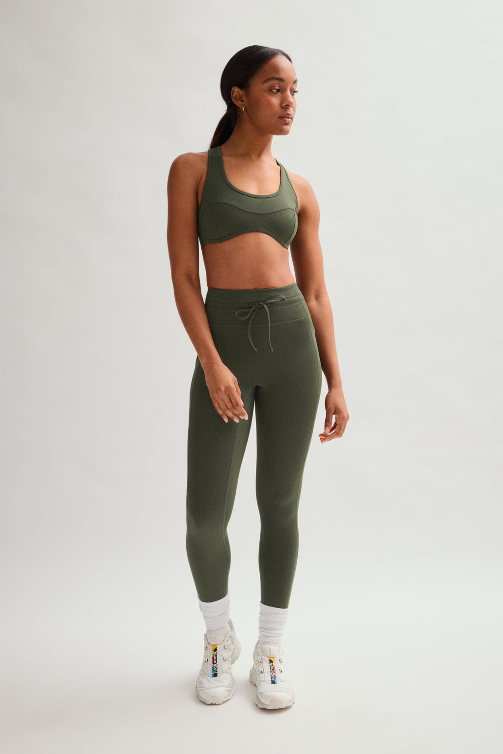Legging de compression à cordon et poche plaquée