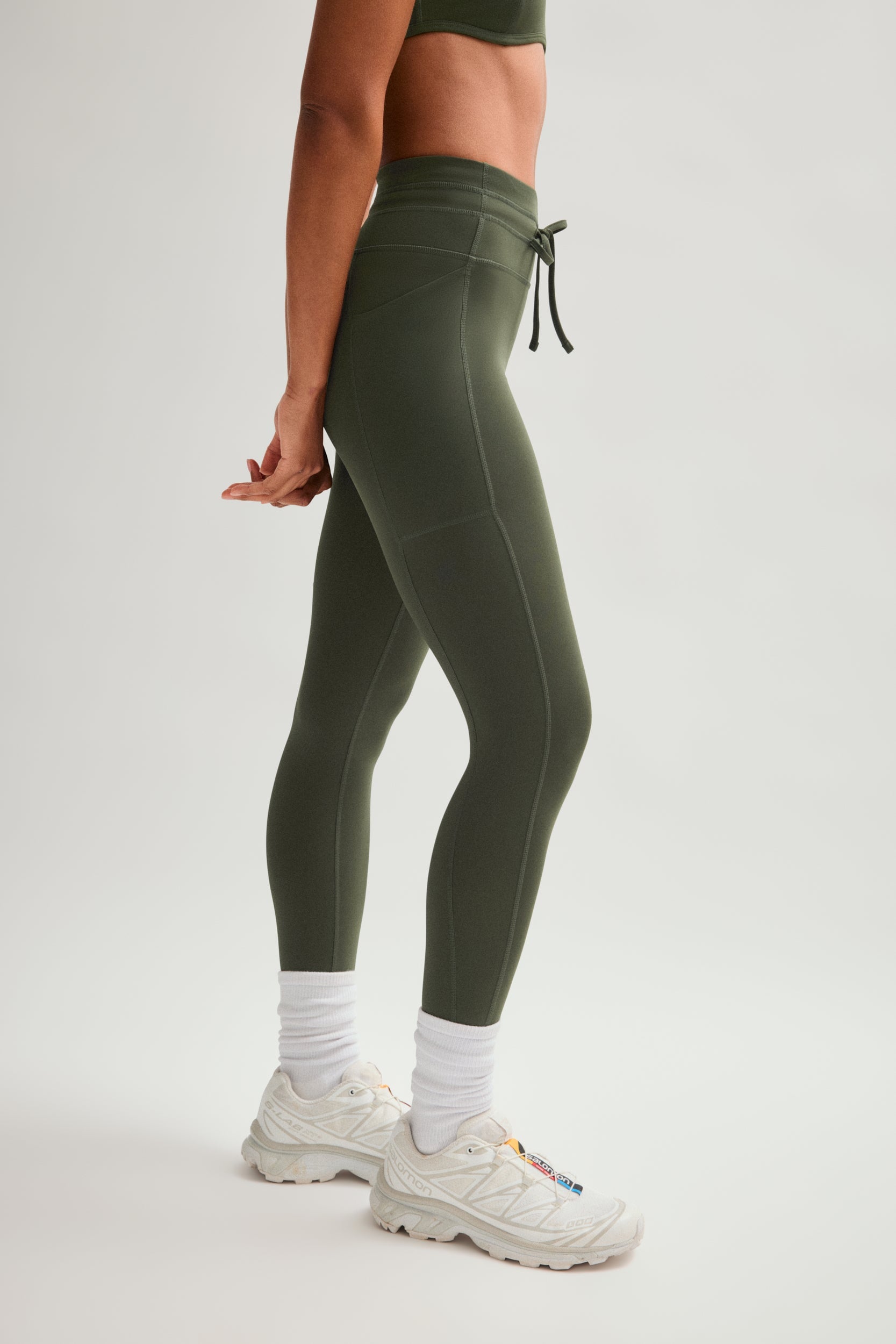 Legging de compression à cordon et poche plaquée