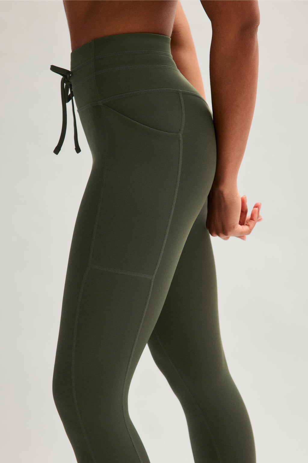 Legging de compression à cordon et poche plaquée
