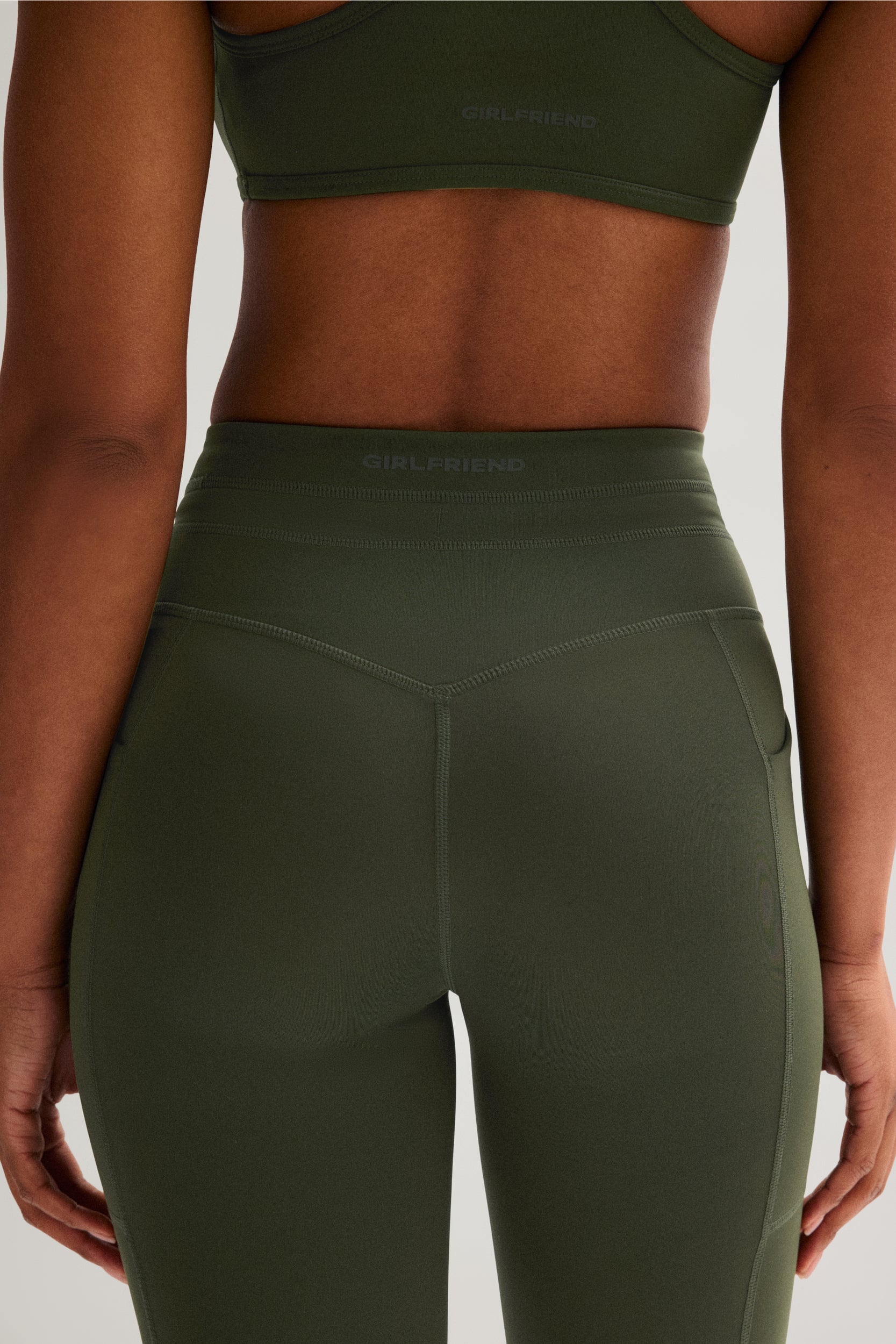 Legging de compression à cordon et poche plaquée