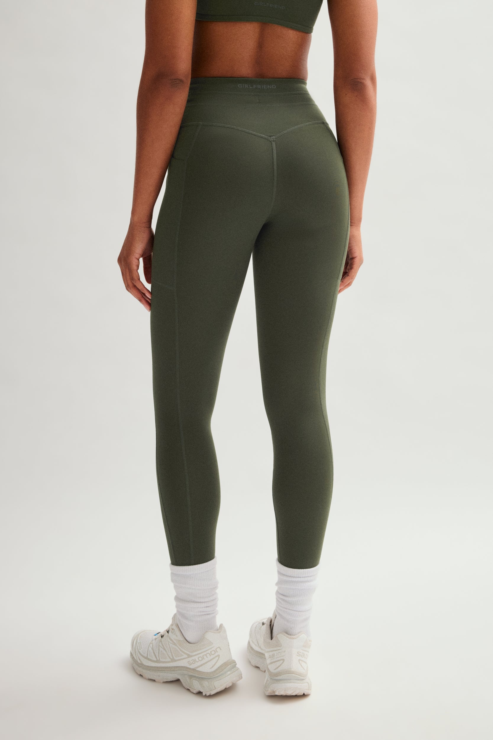 Legging de compression à cordon et poche plaquée